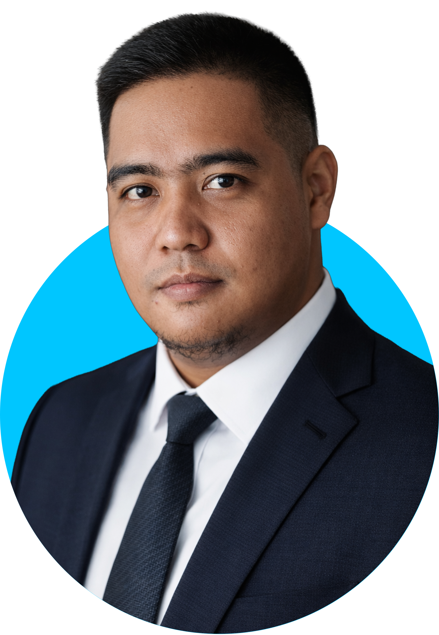 Anthony Ulep, Lead Designer at Dream Design Labs, wearing a formal suit against a bright blue background.